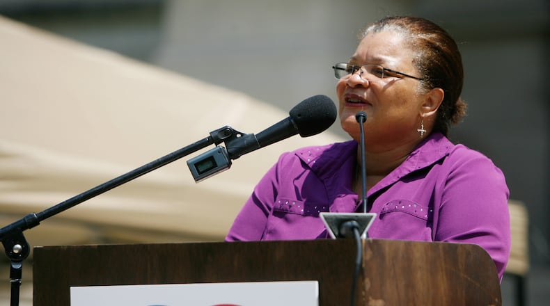 100807 Atlanta -- Dr. Alveda King, the niece of Martin Luther King, Jr., speaks at the National Organization for Marriage's rally on the Georgia state capitol building steps on Saturday, Aug. 7, 2010. King emphasized the procreation aspect of the gay-marriage debate and voiced her concerns that legalizing gay marriage would mean genocide. (CQ) Chris Dunn cdunn@ajc.com The National Organization for Marriage -- a nonprofit that advocates marriage as the union between a man and a woman -- is on a month-long "Summer for Marriage Tour" to 23 U.S. cities to show support for the institution of marriage. The tour stopped at Atlanta for a rally on the state capitol steps. Meanwhile, across the street, supporters of gay-marriage rights gathered for a silent protest. 100807 Atlanta -- Dr. Alveda King, the niece of Martin Luther King, Jr., speaks at the National Organization for Marriage's rally on the Georgia state capitol building steps on Saturday, Aug. 7, 2010. King emphasized the procreation aspect of the gay-marriage debate and voiced her concerns that legalizing gay marriage would mean genocide. (CQ) Chris Dunn cdunn@ajc.com The National Organization for Marriage -- a nonprofit that advocates marriage as the union between a man and a woman -- is on a month-long "Summer for Marriage Tour" to 23 U.S. cities to show support for the institution of marriage. The tour stopped at Atlanta for a rally on the state capitol steps. Meanwhile, across the street, supporters of gay-marriage rights gathered for a silent protest.
