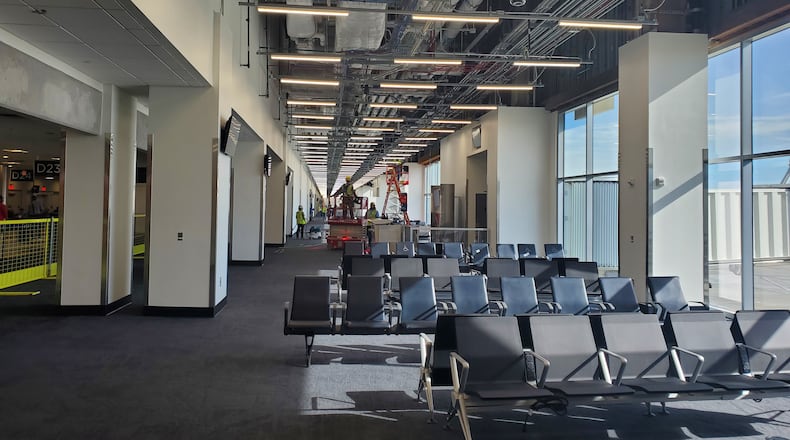 At Hartsfield-Jackson International Airport, workers on September 4, 2024 put the finishing touches on gate areas to complete the first phase of a project to widen Concourse D. Source: Hartsfield-Jackson