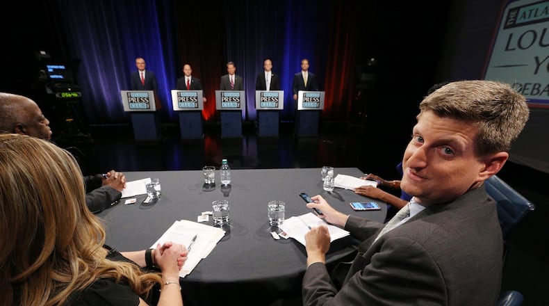 Greg Bluestein poses for a photo ahead of a 2018 Republican primary debate hosted by The Atlanta Press Club.