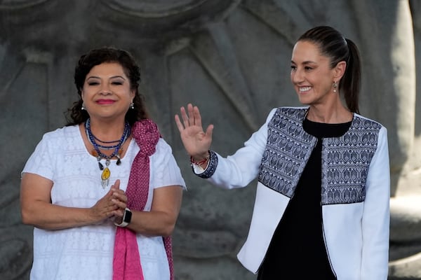 FILE - Mexico City Mayor Clara Brugada and Mexican President Claudia Sheinbaum attend a meeting at the Anthropology Museum in Mexico City, April 3, 2025. (AP Photo/Fernando Llano, File)