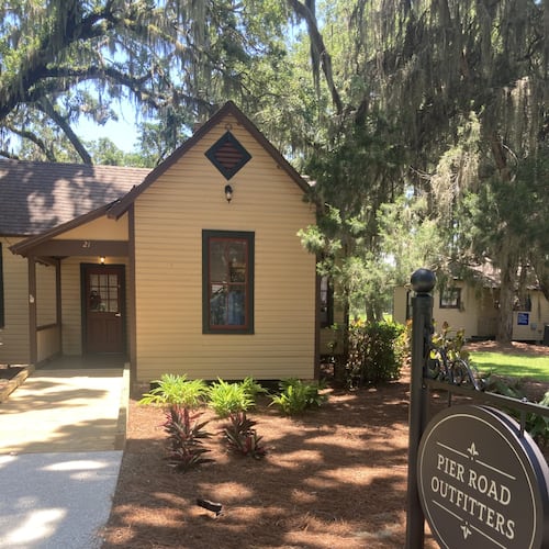 A historic cottage along Jekyll Island's Pier Road is now home to an outdoors outfitter store. (Adam Van Brimmer/AJC)
