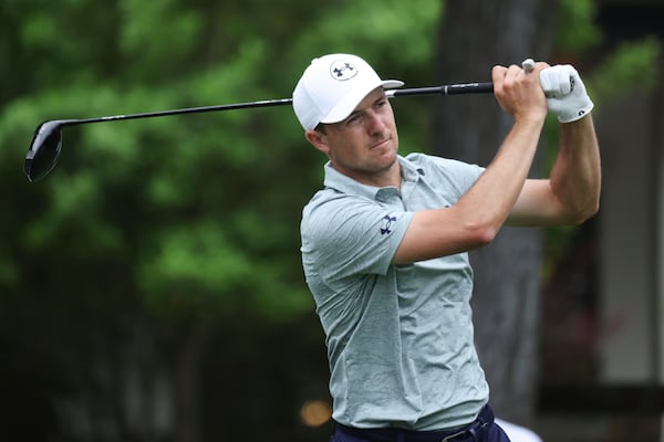 Jordan Spieth follows through on his shot off the sixth tee during the first round of the CJ Cup Byron Nelson golf tournament in McKinney, Texas, Thursday, May 1, 2025. (AP Photo/Gareth Patterson)
