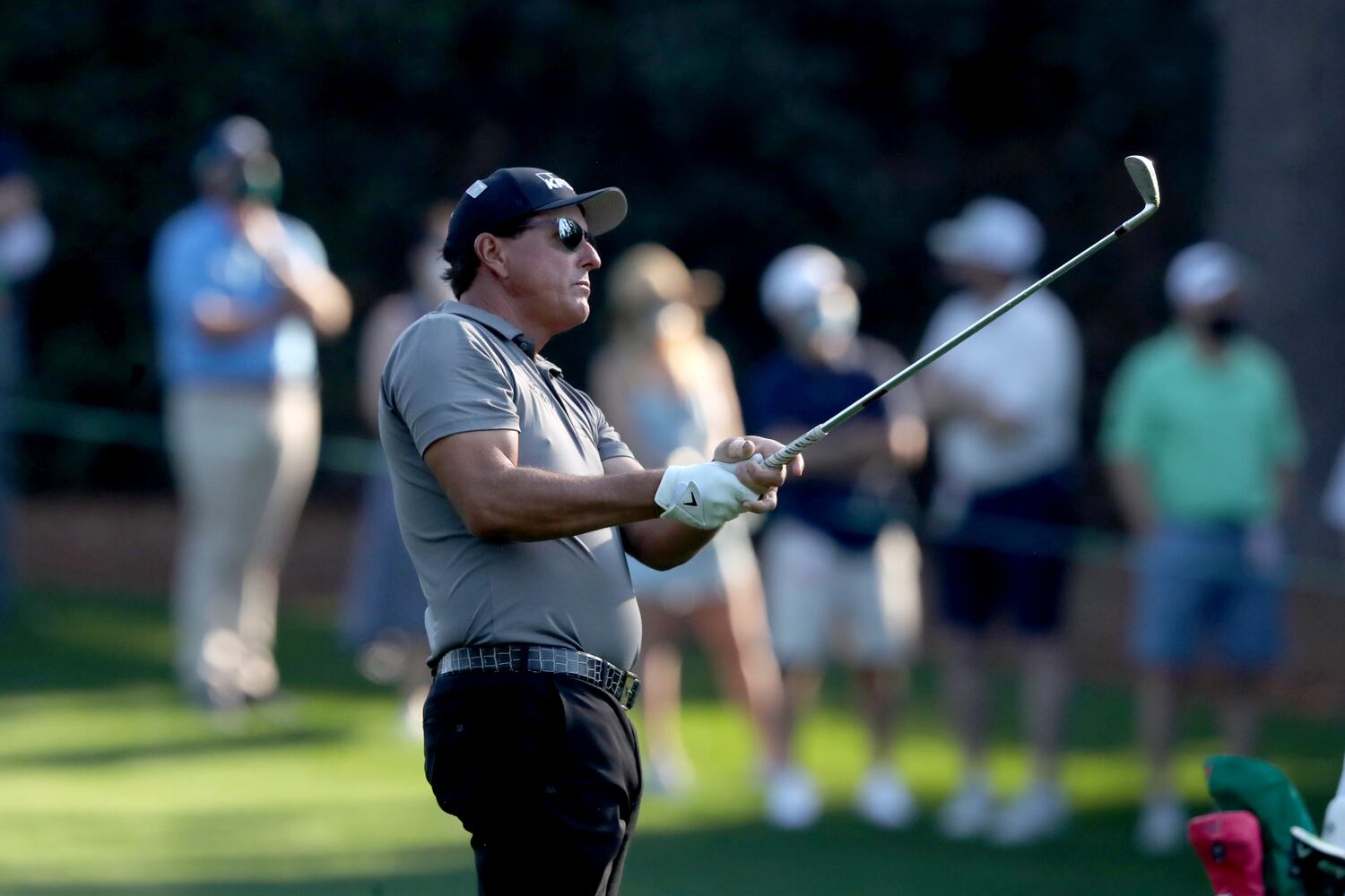 April 7, 2021, Augusta: Phil Mickelson hits his second shot on the tenth hole during his practice round for the Masters at Augusta National Golf Club on Wednesday, April 7, 2021, in Augusta. Curtis Compton/ccompton@ajc.com