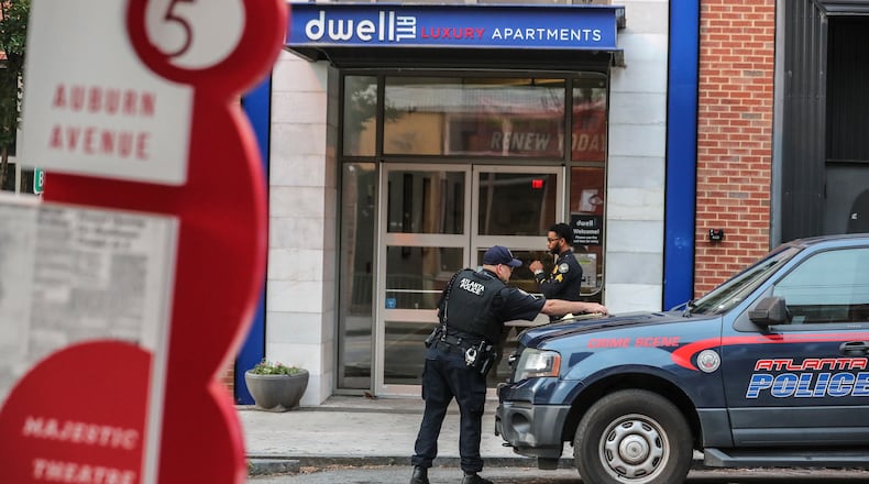 Atlanta police investigated the scene Wednesday after a shooting occurred at the Dwell ATL apartments on Auburn Avenue.