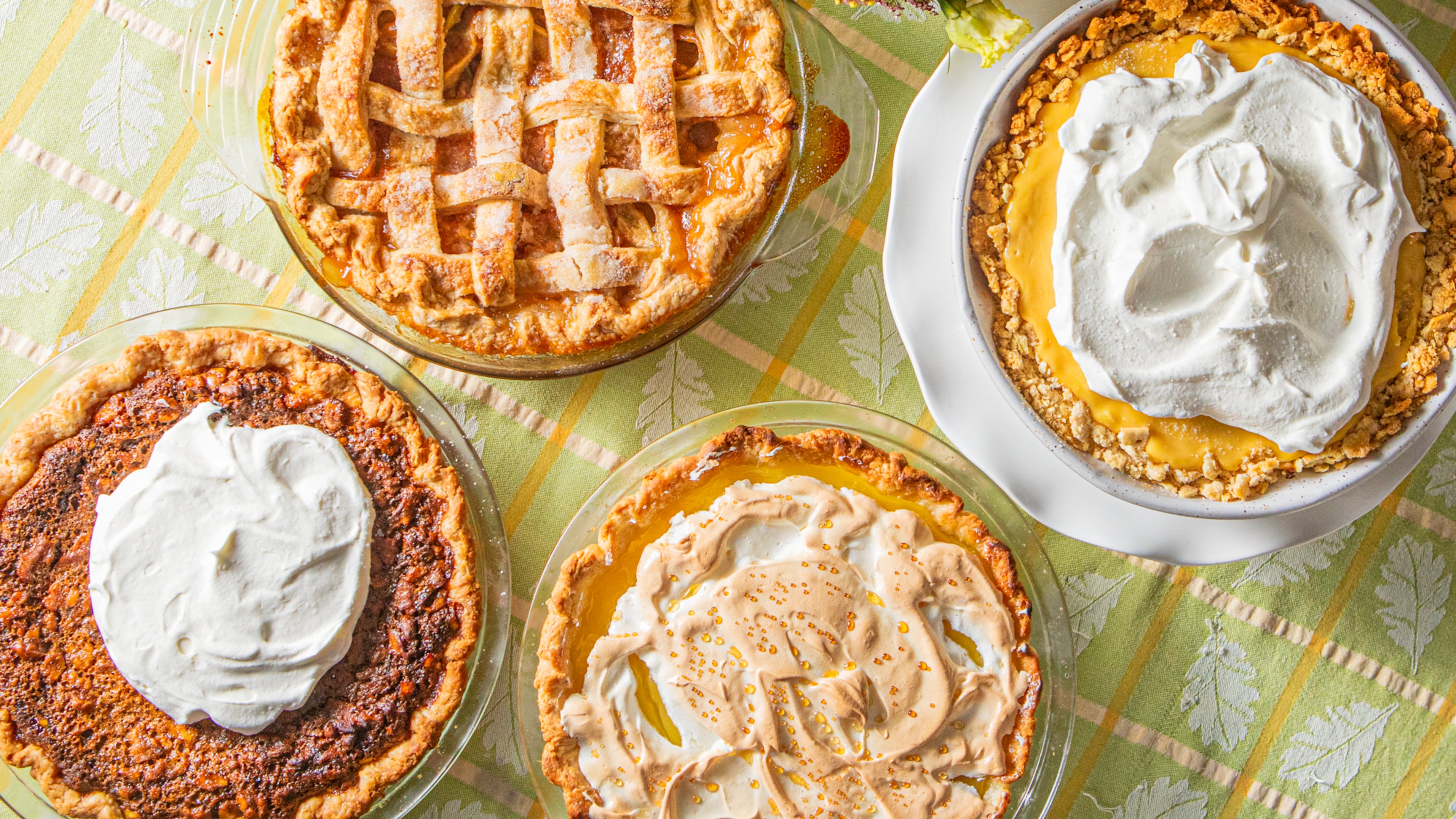 These classic Southern pies have a history that spans decades. Clockwise from top left: Green tomato pie, Crook's Corner's Atlantic Beach pie, vinegar pie and Dinah Shore's chocolate chip walnut pie. (Aaliyah Man for the AJC)