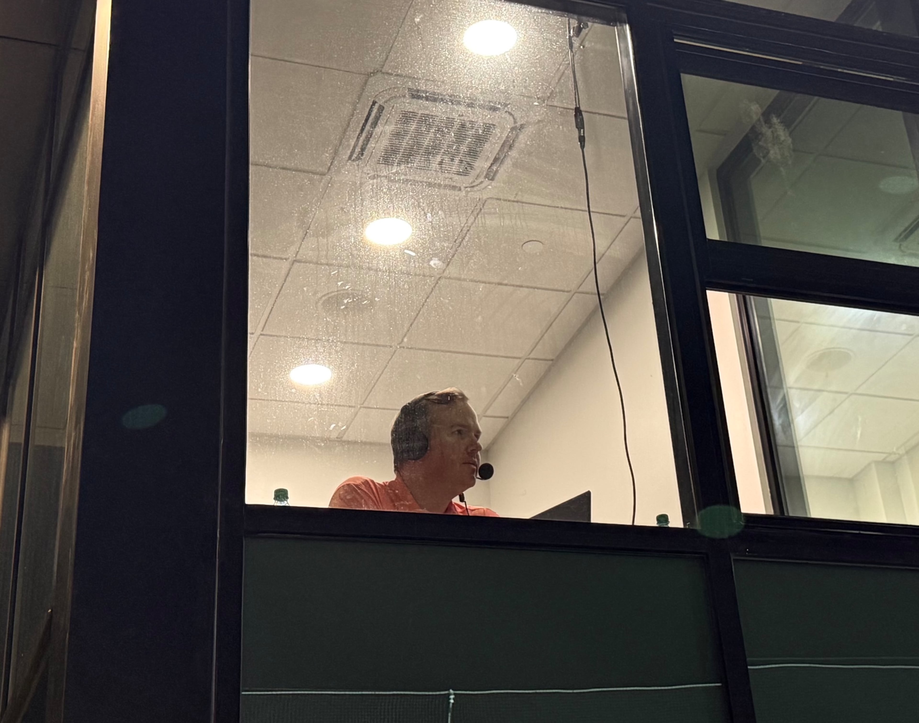 U.S. Rep. Brian Jack was in the booth calling a Columbus Clingstones minor league baseball game Friday. (Greg Bluestein/AJC)