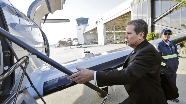 November 7, 2016 - Chamblee - Georgia Secretary of State Brian Kemp boards a plane Monday morning at Peachtree-DeKalb Airport, kicking off a statewide tour ahead Tuesday’s Election Day. BOB ANDRES /BANDRES@AJC.COM