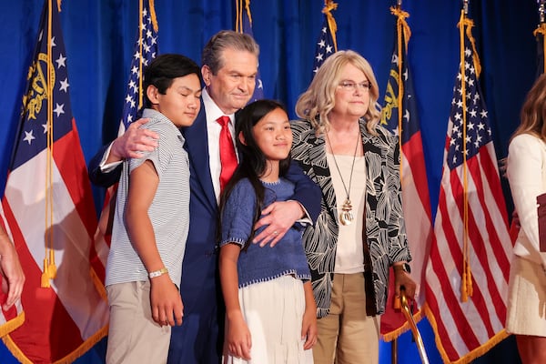Georgia gubernatorial candidate Rick Jackson greets his family at his election night party at the Omni at the Battery during the 2026 Georgia primary elections Tuesday, May 19, 2026, in Atlanta. (Jason Getz/AJC)