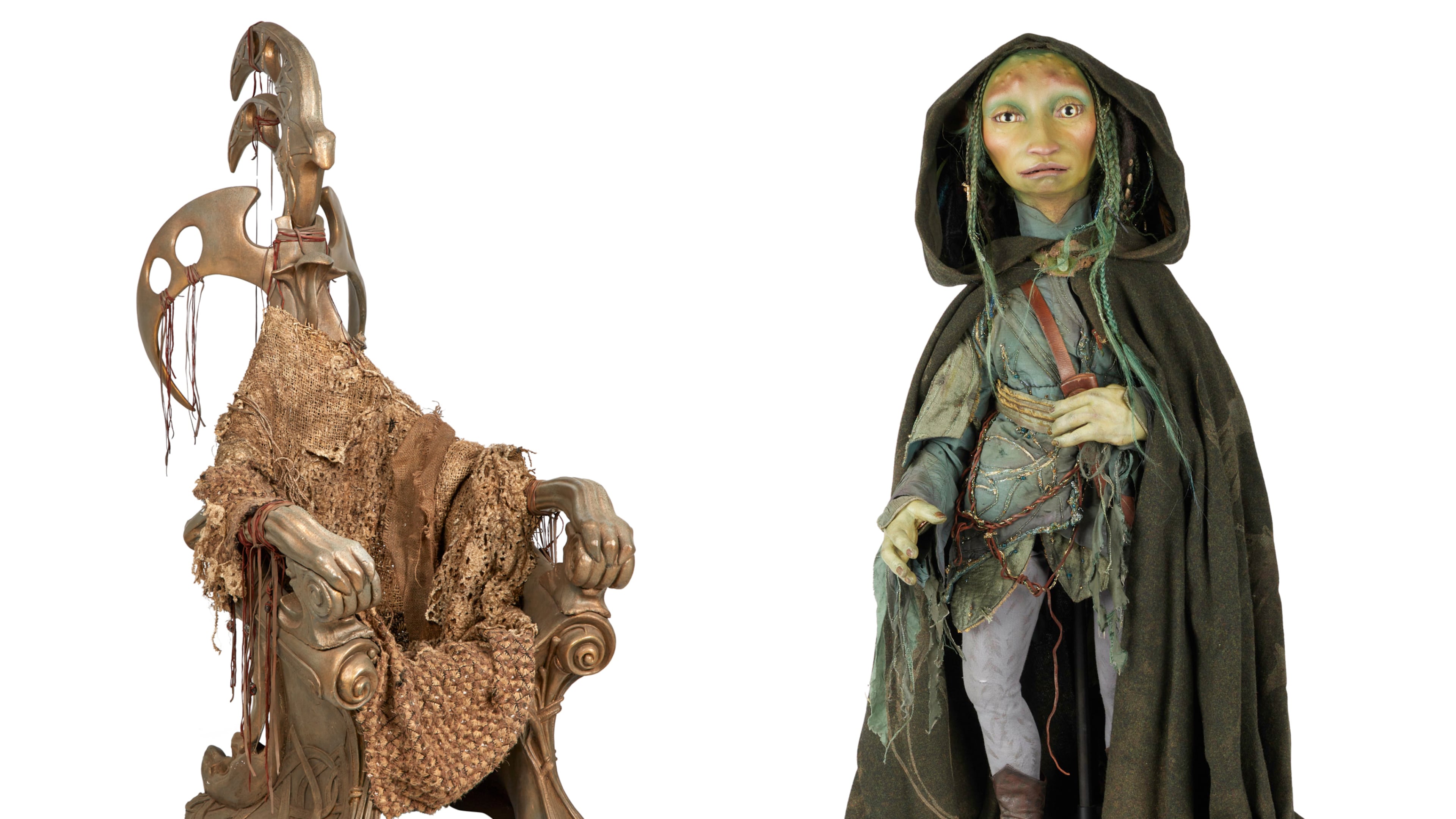 This combo of images provided by Julien's Auctions shows, from left, Dark Crystal skekGra the Heretic Circle of the Suns Skeksis Chair and The Dark Crystal Naia (Hannah John-Kamen) Drenchen Gelfling, part of more than 400 props, costumes and set pieces from Muppets creator Jim Henson’s extensive career will go up for auction this fall. (Julien's Auctions via AP)