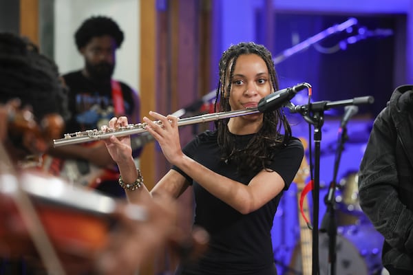 The Renaissance Orchestra, including Ameerah McFarland, rehearses at 800 East Studios in Atlanta on Wednesday, March 11, 2026. (Arvin Temkar/AJC)