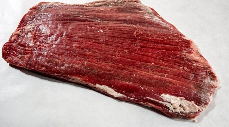 Summer is here and that means many grillers are stepping up to the heat and putting a big steak on the fire. One option to cook is the flank steak. (Bill Hogan/Chicago Tribune/MCT)