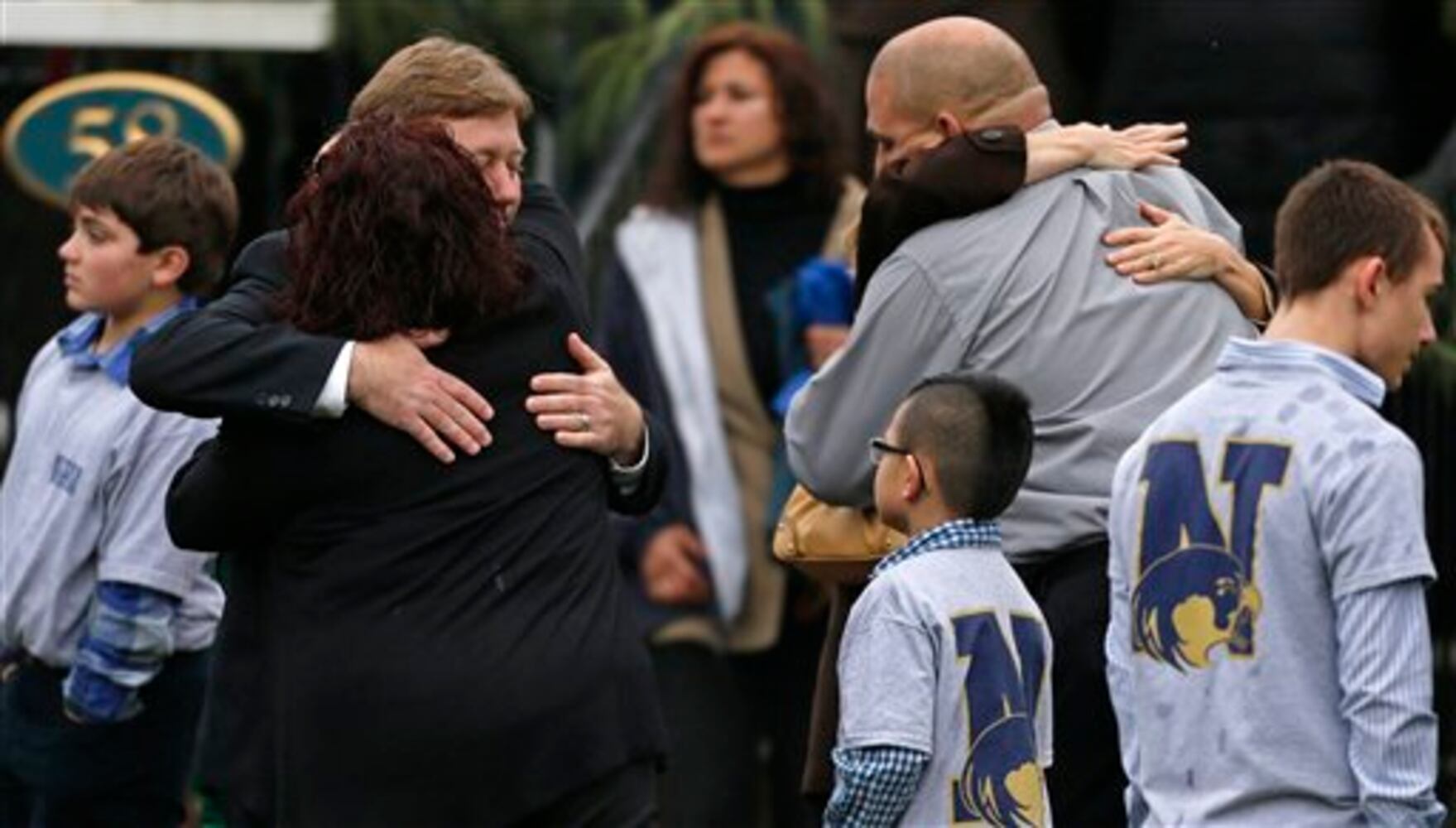 Newtown holds the first funerals for the victims
