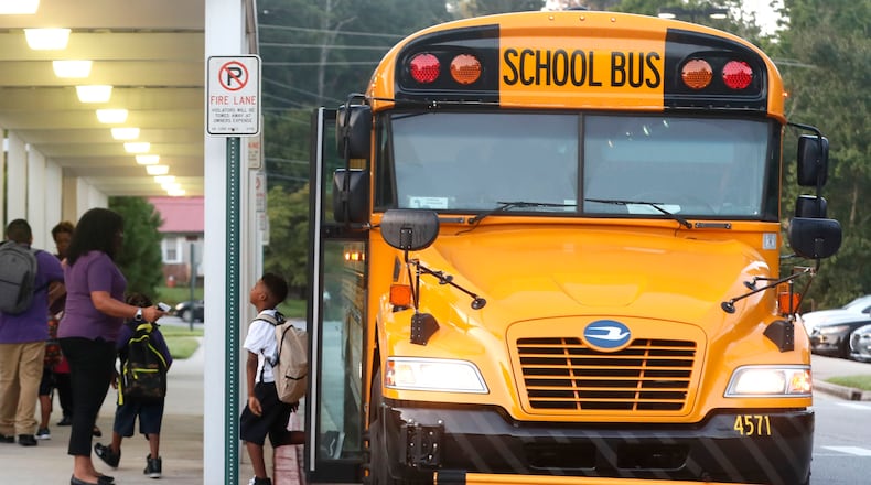 Students arrive for the first day of the 2018-2019 school year at Hamilton E. Holmes Elementary in East Point. BOB ANDRES  /BANDRES@AJC.COM