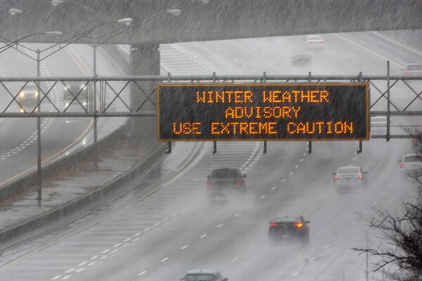 States authorities advise everyone to stay out the roads as snow falls in parts of metro Atlanta on Sunday. January 16, 2022 Miguel Martinez for The Atlanta Journal-Constitution 