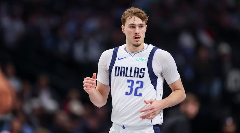 Dallas Mavericks forward Cooper Flagg (32) runs the court in the first half of an NBA basketball game against the San Antonio Spurs Thursday, Feb. 5, 2026, in Dallas. (AP Photo/Gareth Patterson)