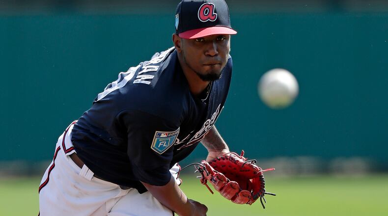 Julio Teheran pitched nine scoreless innings over his first three spring starts before giving up six runs and two hits in five innings Wednesday against the Phillies. (AP file photo/John Raoux)