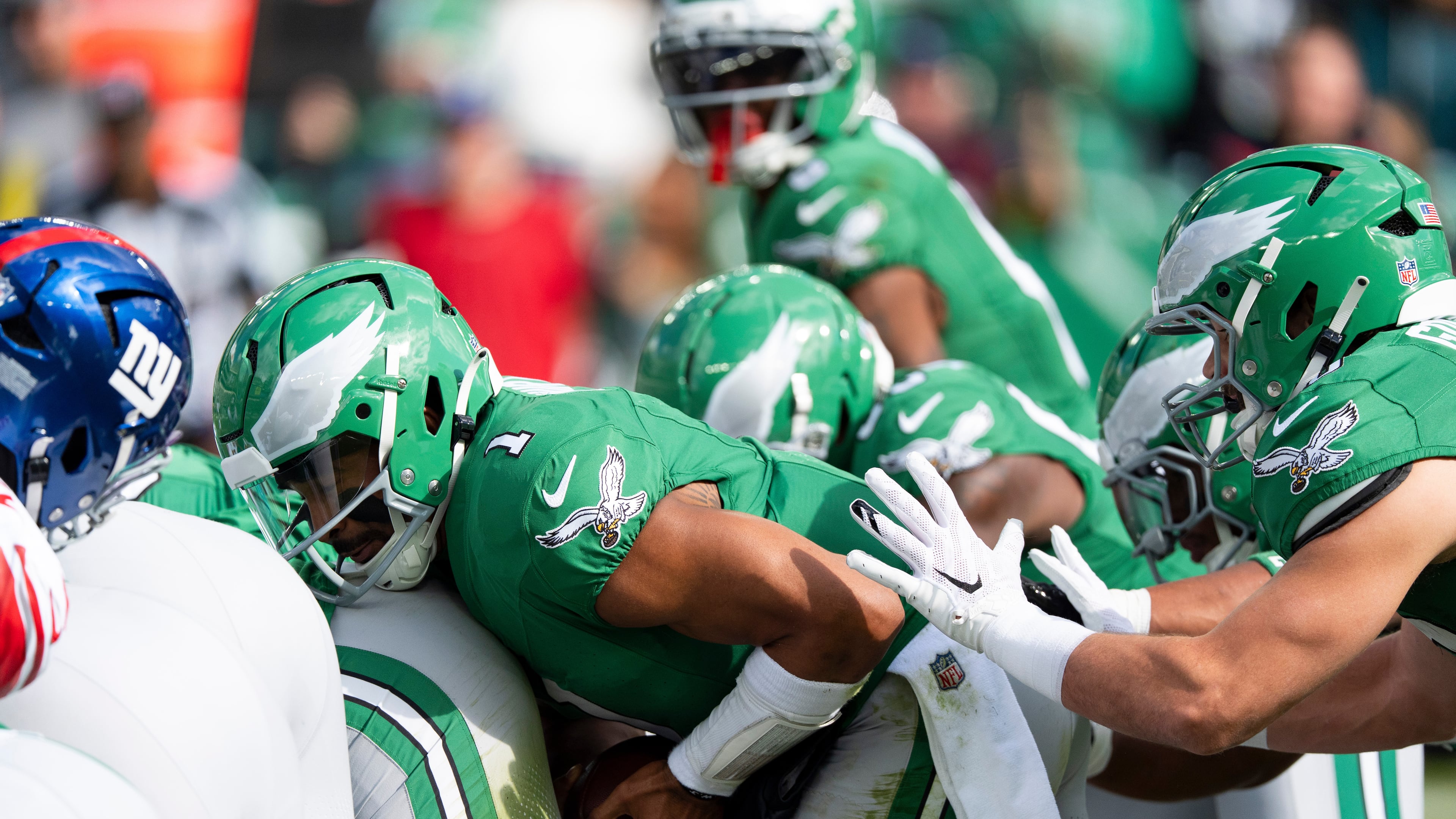 FILE - Philadelphia Eagles quarterback Jalen Hurts runs the "tush push" play during an NFL football game against the New York Giants, Oct. 26, 2025, in Philadelphia. (AP Photo/Chris Szagola, File)