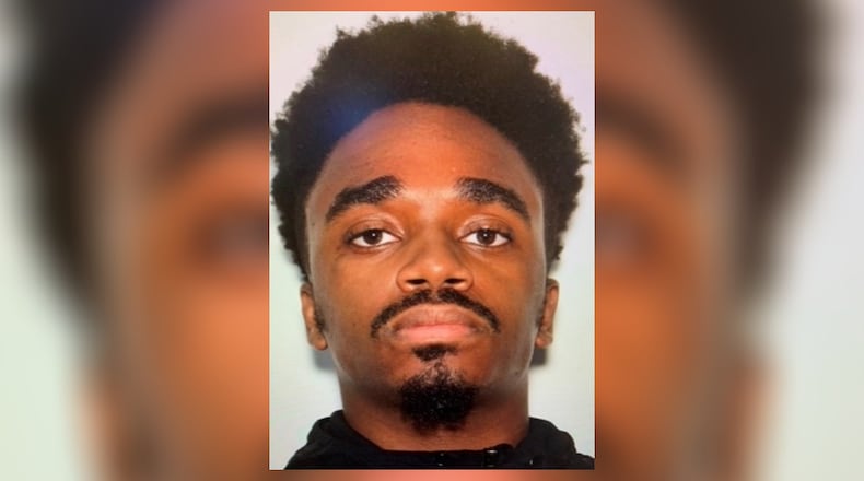 Brackus Golden, 24, was taken into custody on a murder charge in connection with a shooting Sunday evening in the Woodstock area.