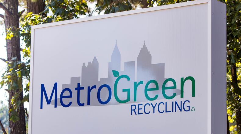 Th Metro Green Recycling plant on Snapfinger Woods Drive is currently not operating due to a permitting issue Wednesday, Sept 29, 2021.  Residential properties are next to industrial operations allowing for industrial vehicles overflowing roadways, abandoned homes turning into dump sites and DeKalb County residents living beside concrete production facilities and junkyards. (Jenni Girtman for The Atlanta Journal-Constitution)