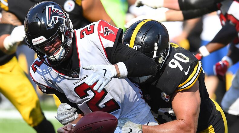 Falcons QB Matt Ryan fumbles as he is hit by T.J. Watt during Sunday's 41-17 Steelers victory in Pittsburgh. (Photo by Joe Sargent/Getty Images)