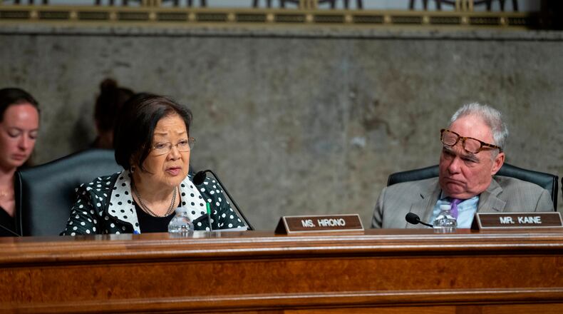 Sen. Mazie Hirono, D-Hawaii, left, questions a witness as Sen. Tim Kaine, D-Va., right, looks on during the Senate Committee on Armed Services hearing on Capitol Hill in Washington, Tuesday, April 28, 2026. (AP Photo/Cliff Owen)