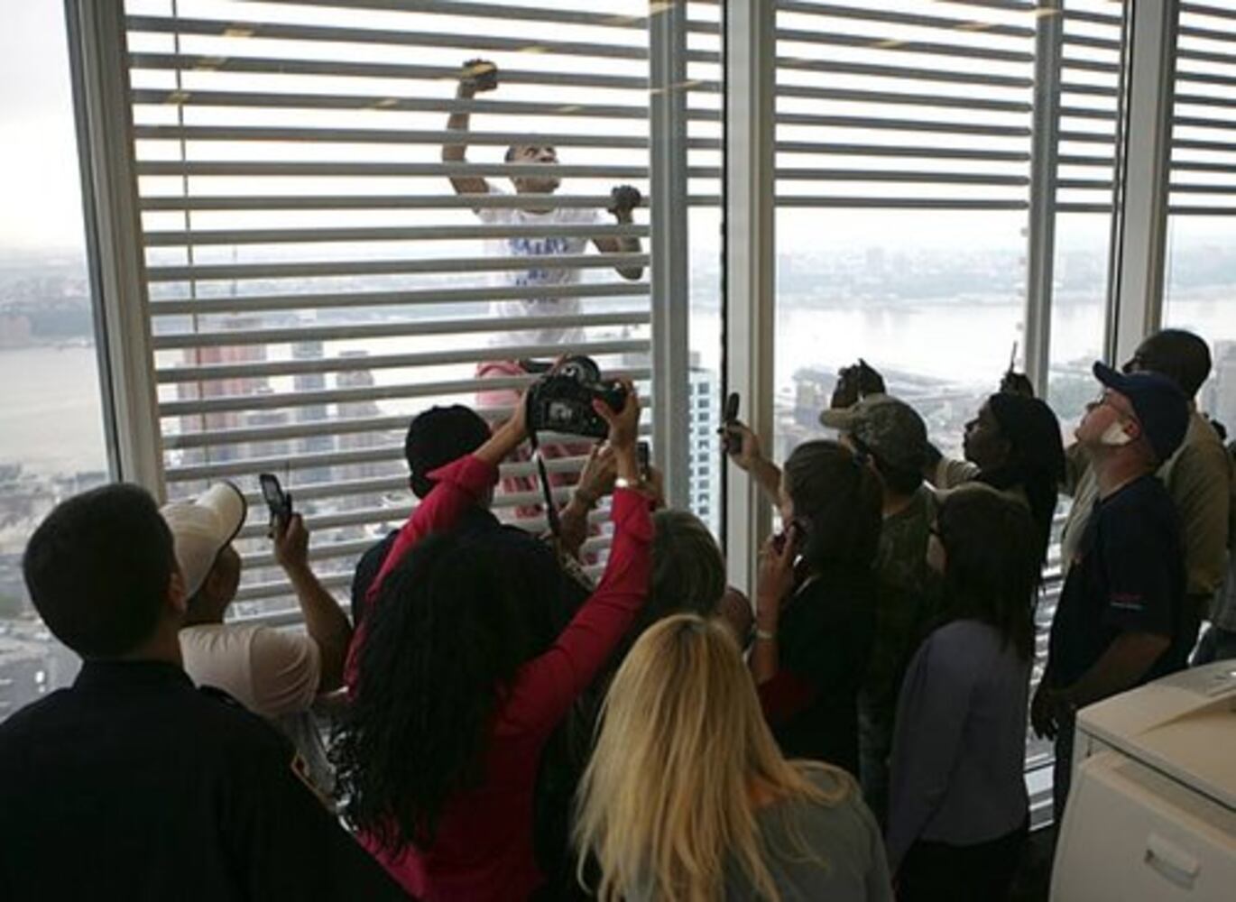 Two daredevils scale New York Times building