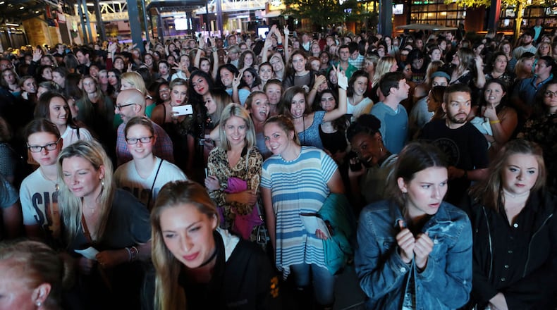 Part of the crowd that packed inside and outside the Coca-Cola Roxy Theatre at the Battery last October for Harry Styles lightning-fast sellout of a show. Styles is back in town Monday for a show with country crooner Kacey Musgraves at the Inifinity Energy Arena in Duluth. Robb Cohen Photography & Video /RobbsPhotos.com