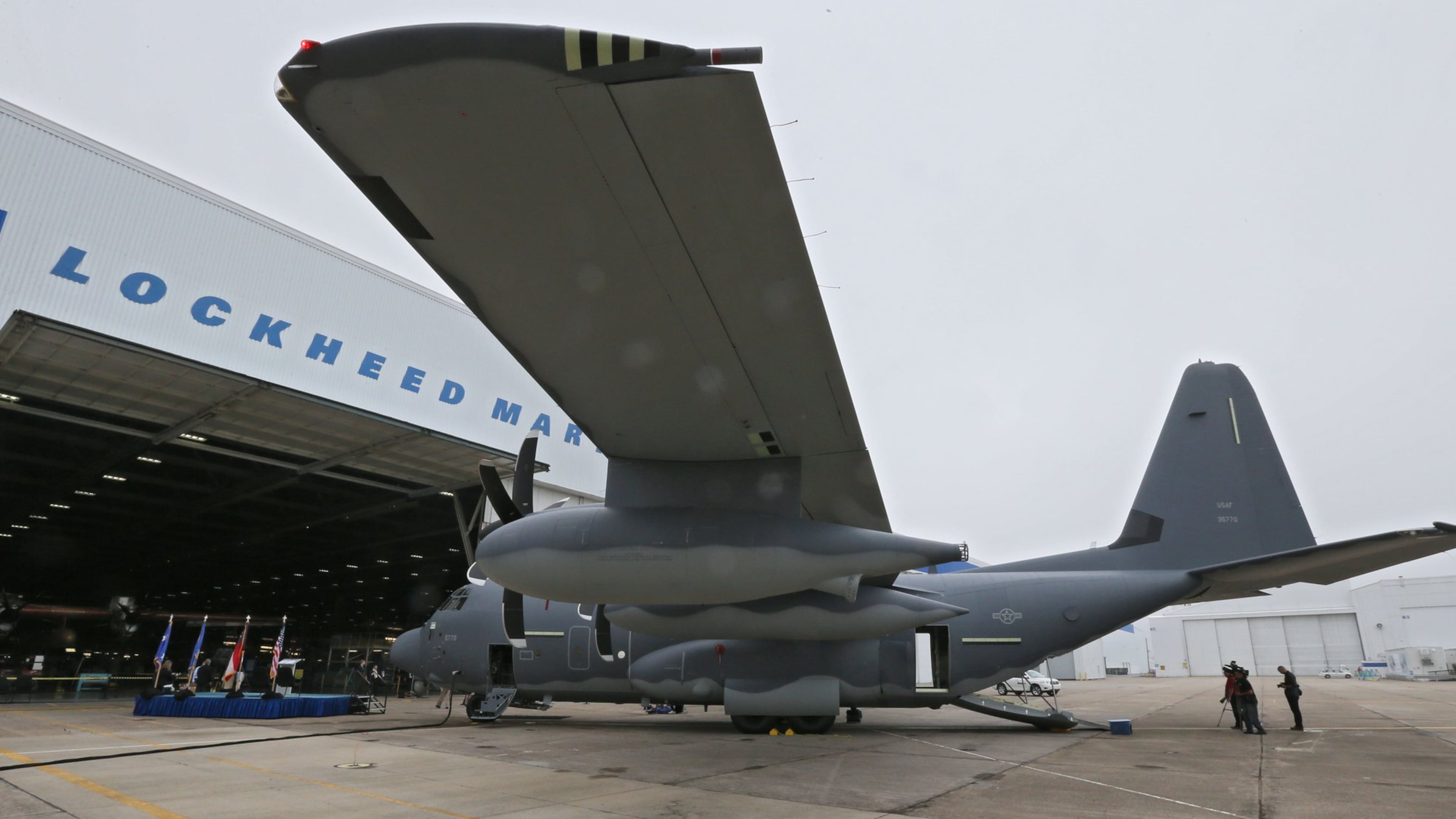 In 2015, then-Gov. Nathan Deal commemorated the 60th anniversary of the first flight of the first C-130 Hercules built at the Marietta production facility by reenacting the 1955 christening, this time of a C-130J Super Hercules. (File/AJC