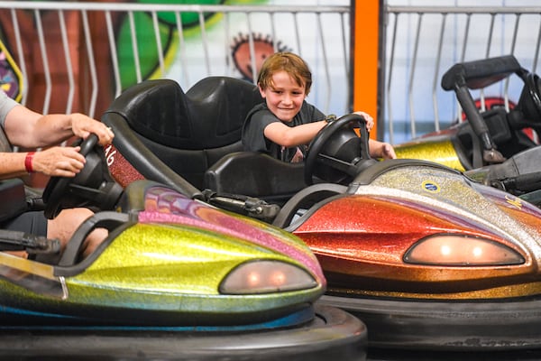 Visitors play bumper car at Fun Spot America theme park in Fayetteville in 2024. (Ziyu Julian Zhu/AJC)