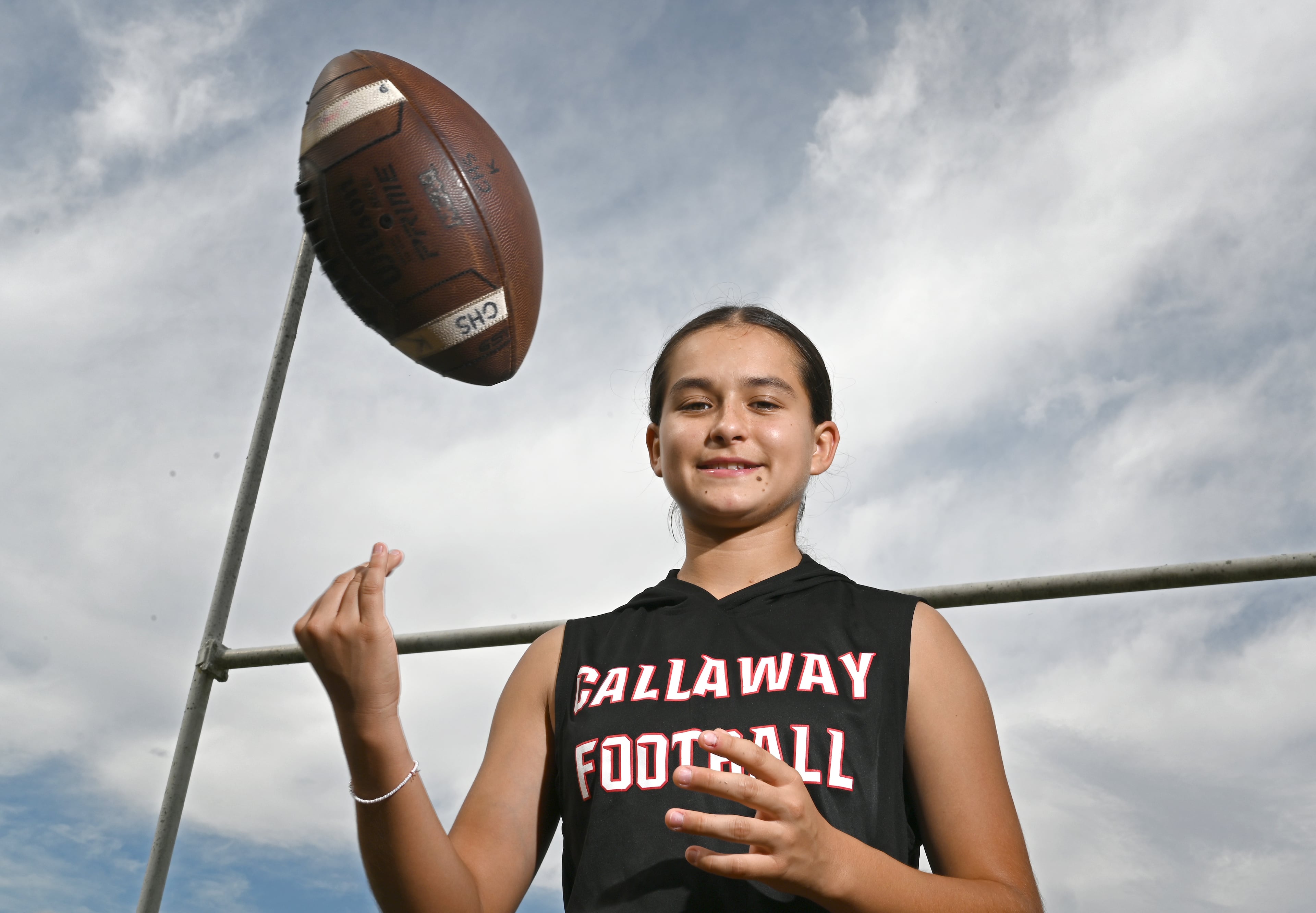 Callaway High’s Mia Flores, who is the first female football player in the school’s history, poses for a portrait at Callaway High School on Thursday, Sept. 25, 2025, in Hogansville. (Hyosub Shin/AJC)