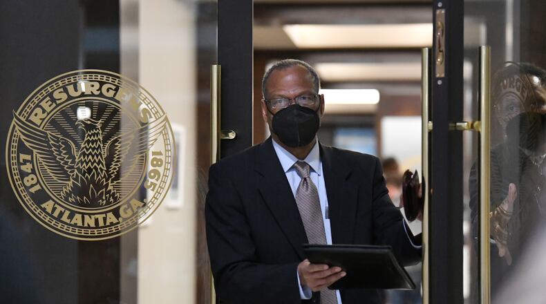 February 3, 2022 Atlanta - Integral Group CEO Egbert Perry leaves the Office of the Mayor after a press conference at Atlanta City Hall on Thursday, February 3, 2022. Mayor Andre Dickens announced the settlement at City Hall with Integral Group CEO Egbert Perry and the Atlanta Housing Authority President Eugene Jones. (Hyosub Shin / Hyosub.Shin@ajc.com)