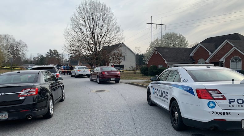 A man was killed and a teenager was injured Saturday morning during a double shooting in a Gwinnett County neighborhood, police said.