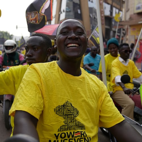 Supporters of Ugandan President Yoweri Museveni celebrate his victory in the presidential election in Kampala, Uganda, Saturday, Jan. 17, 2026. (AP Photo/Brian Inganga)