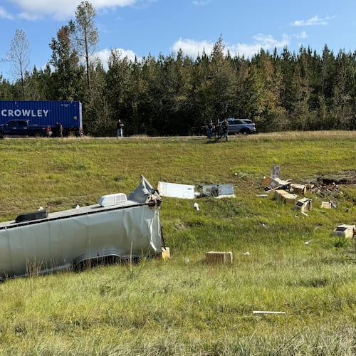 This photo provided by Scotty Ray Boyd shows an overturned truck which had been transporting several monkeys, Tuesday, Oct. 28, 2025, in Heidelberg, Miss. (Scotty Ray Boyd via AP)