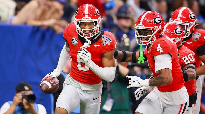 Bulldogs defensive back Daylen Everette (left) celebrates a fumble recovery for a 47-yard touchdown against the Ole Miss Rebels during the Sugar Bowl at the Caesars Superdome on Thursday, Jan. 1, 2026, in New Orleans. Everette was one of Pittsburgh’s three third-round picks. (Jason Getz/AJC)
