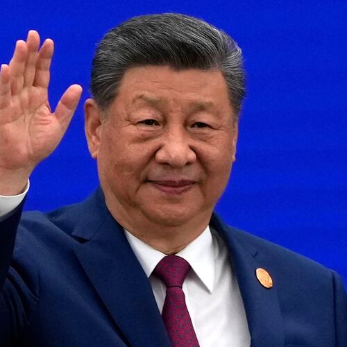 Chinese President Xi Jinping waves as he arrives at the opening ceremony for the World AI Conference in Shanghai, Friday, July 17, 2026. (AP Photo/Ng Han Guan, Pool)
