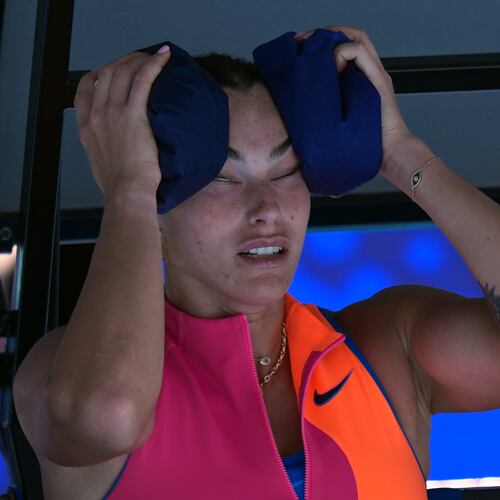 Aryna Sabalenka of Belarus places ice packs to her face during her quarterfinal match against to Iva Jovic of the U.S. at the Australian Open tennis championship in Melbourne, Australia, Tuesday, Jan. 27, 2026. (AP Photo/Aaron Favila)