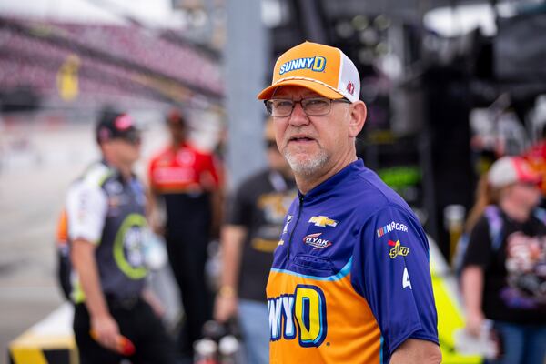 NASCAR crew chief Matt Kelley walks out to pit road before the Goodyear 400, Sunday, April 6, 2025, in Darlington, S.C. (AP Photo/Scott Kinser)