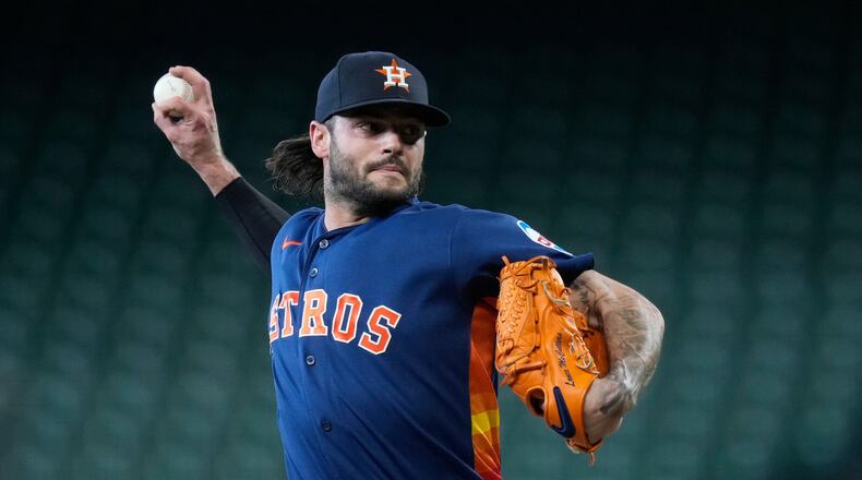 FILE - Lance McCullers Jr. of the Houston Astros throws to live batters before a baseball game against the Cleveland Guardians, June 19, 2026, in Houston. (AP Photo/Kevin M. Cox, File)