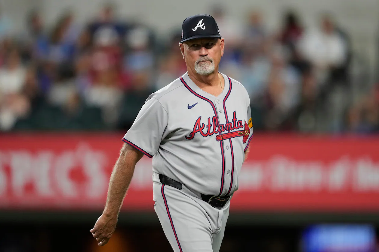 FILE - Atlanta Braves manager Brian Snitker walks back to the dugout after making a pitching change in the sixth inning of a baseball game against the Texas Rangers, Sunday, July 27, 2025, in Arlington, Texas. (AP Photo/Tony Gutierrez,File)