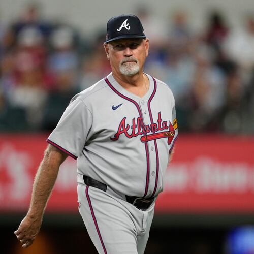 FILE - Atlanta Braves manager Brian Snitker walks back to the dugout after making a pitching change in the sixth inning of a baseball game against the Texas Rangers, Sunday, July 27, 2025, in Arlington, Texas. (AP Photo/Tony Gutierrez,File)