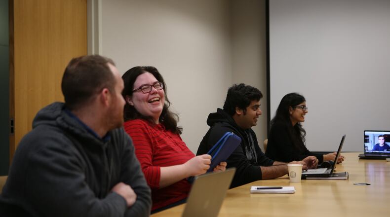 January 27, 2017, Atlanta, Georgia - TA’s part of a group conducting a study on the effectiveness of a basic artificial intelligence teaching assistant that answers questions regarding the course details participate in a round table to talk about where they’re at in the study in Atlanta, Georgia, on Friday, January 27, 2017. (HENRY TAYLOR / HENRY.TAYLOR@AJC.COM)