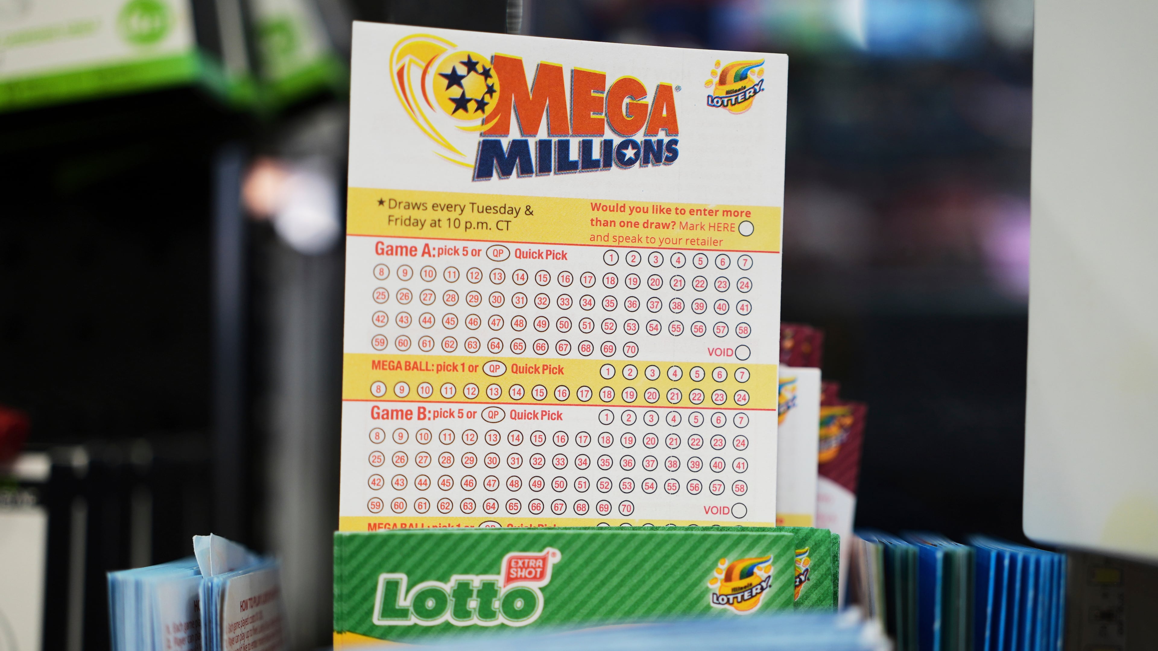 FILE - Mega Millions Lottery play slips are displayed for customers at a convenience store in Chicago, Sunday, April 6, 2025. (AP Photo/Nam Y. Huh, file)