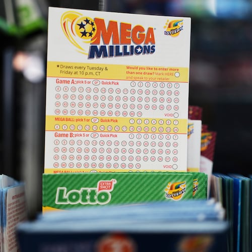 FILE - Mega Millions Lottery play slips are displayed for customers at a convenience store in Chicago, Sunday, April 6, 2025. (AP Photo/Nam Y. Huh, file)