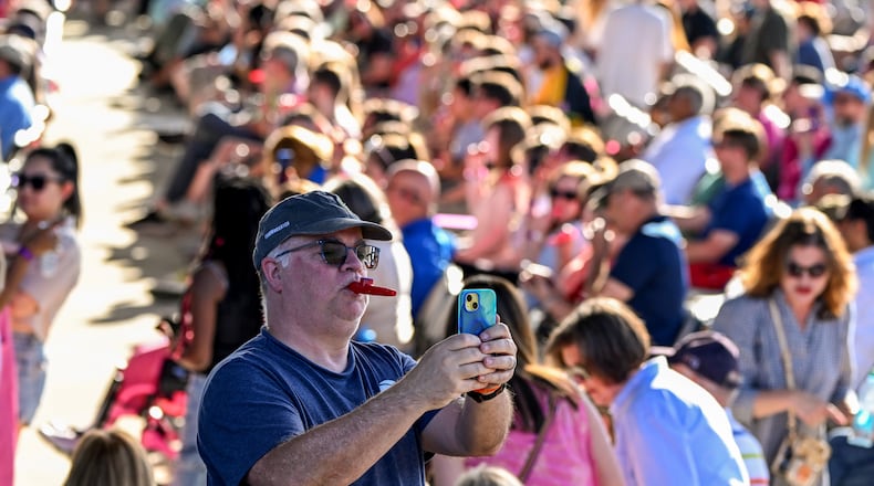 One kazooist snaps a selfie in Macon on Friday as he and hundreds of others gathered to try to break the world record for the largest kazoo ensemble.
(Jason Vorhees / The Macon Melody)