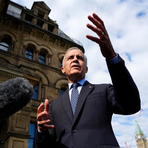 Prime Minister Mark Carney speaks to journalists as he arrives at the Office of the Prime Minister and Privy Council in Ottawa, on Tuesday, Sept. 1, 2026. (Justin Tang/The Canadian Press via AP)