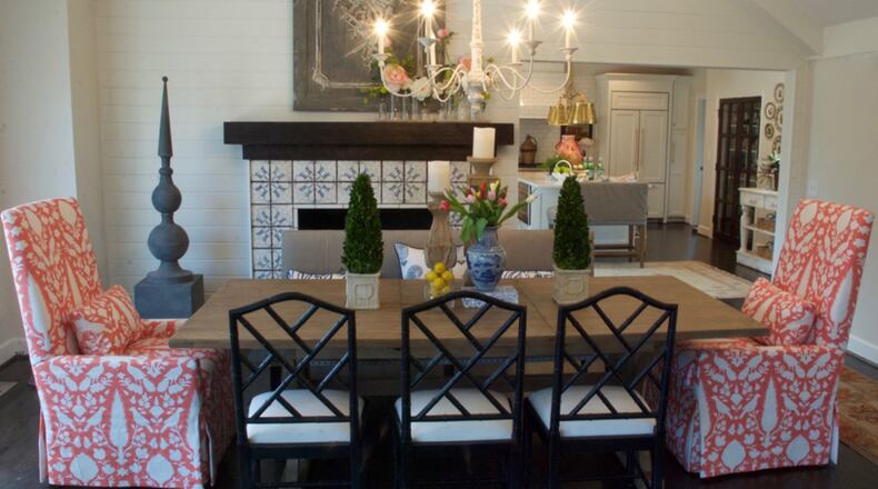 To open up the room and give it more light and life, they bumped up the ceiling into unused attic space above, covered the wall in shiplap, accentuated the fireplace with hand-painted tiles and used a piece of reclaimed wood as the mantel. (Mary Carol Garrity/TNS)