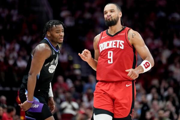 Houston Rockets forward Dillon Brooks (9) reacts after making a three point basket against the Utah Jazz during the first half of an NBA basketball game Wednesday, April, 2, 2025, in Houston. (AP Photo/Eric Christian Smith)
