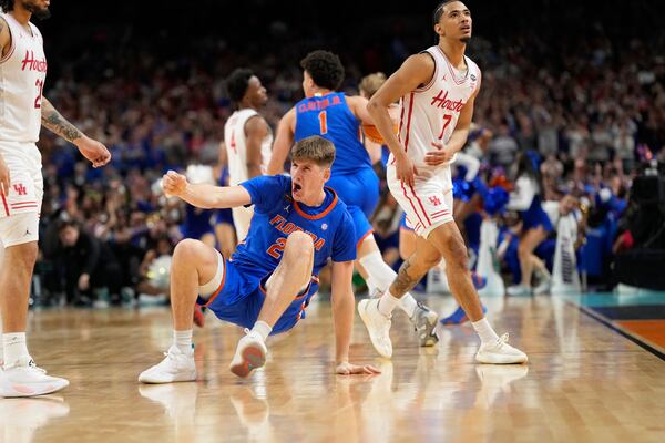 Florida's Alex Condon (21) reacts after Florida beat Houston in the national championship at the Final Four of the NCAA college basketball tournament, Monday, April 7, 2025, in San Antonio. (AP Photo/Eric Gay)