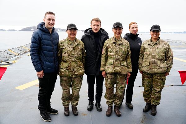 French President Emmanuel Macron, center, Danish Prime Minister Mette Frederiksen, 2nd right, and Greenlandic leader Jens-Frederik Nielsen aboard the Danish frigate F363 Niels Juel in Nuuk, Greenland, Sunday, June 15, 2025.(Mads Claus Rasmussen/Ritzau Scanpix via AP)